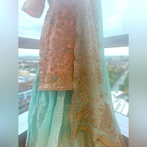 Stylish Designer Cream And Pastel Silk Lehenga Set - Rent main image 0